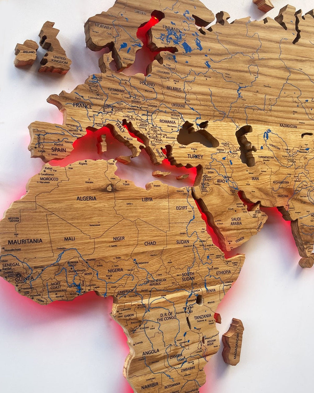 World map illuminated from solid oak-1