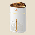 NovaPulse ChromaMist humidifier in modern white with gold details and a triangular lid