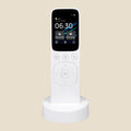 White NovaPulse CommandDock remote with touchscreen and charging dock for a smart home