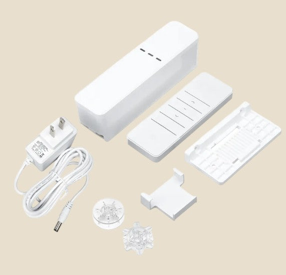 NovaPulse NovaShutter set with white smart blind motor, remote control, power adapter and mounting parts