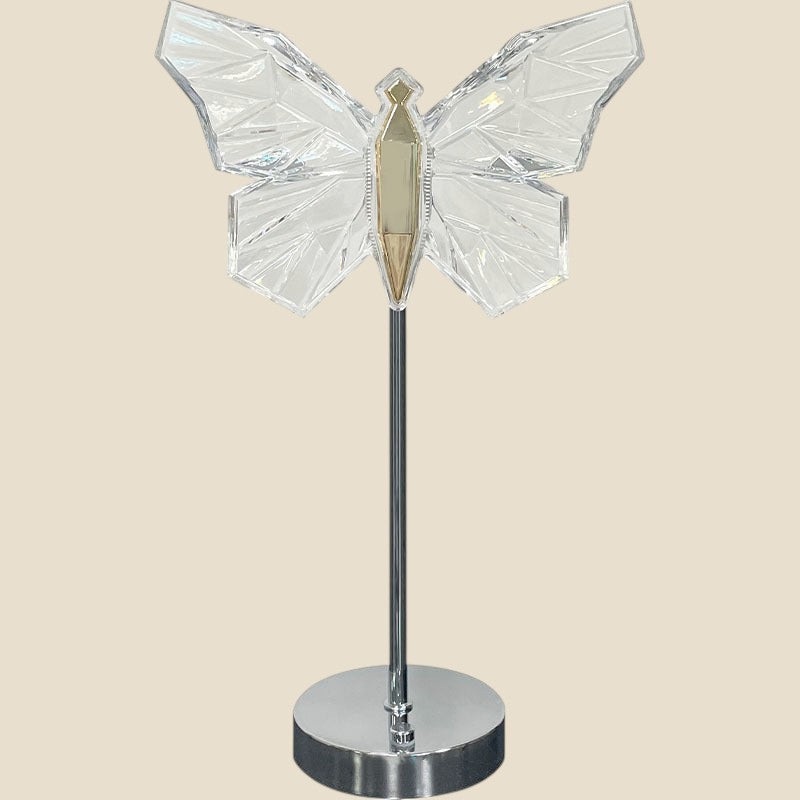 Lampa nocna LED NovaPulse w kształcie kryształowego motyla z chromowaną podstawą, idealna do sypialni.