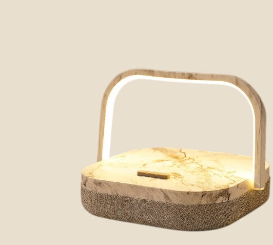 Lampa NovaPulse LanternLux z ciepłym światłem LED, wbudowanym głośnikiem Bluetooth i podstawą do ładowania bezprzewodowego