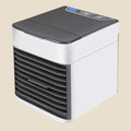Compact white and grey NovaPulse mini desktop air conditioner with USB power