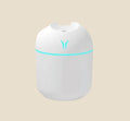 White NovaPulse mini air humidifier with subtle blue LED lighting and USB power