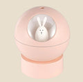 NovaPulse BunnyMist humidifier shaped like a pink sphere with a cute white rabbit inside