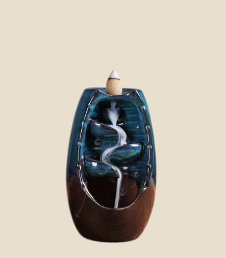 Niebieski ceramiczny kominek zapachowy NovaPulse z efektem wodospadu dymu do medytacji i relaksu