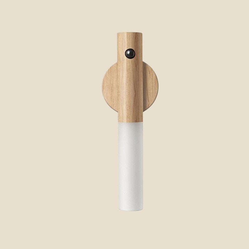 NovaPulse OakSense wooden PIR motion sensor lamp with a magnetic mount, emitting warm LED light
