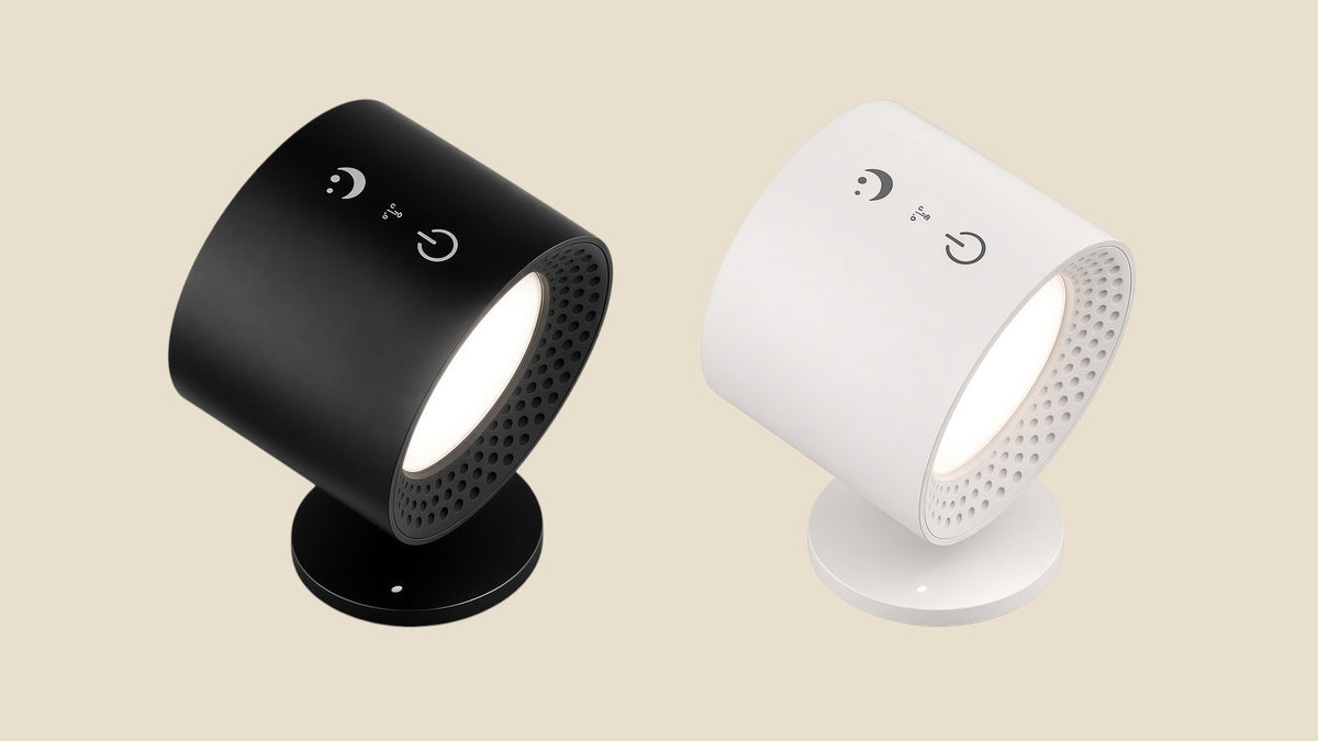 Two NovaPulse PivotRGB wireless wall spotlights in black and white with 360-degree rotation