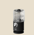 NovaPulse PulseMist 360 air humidifier with rotating nozzle, black casing and clear water tank
